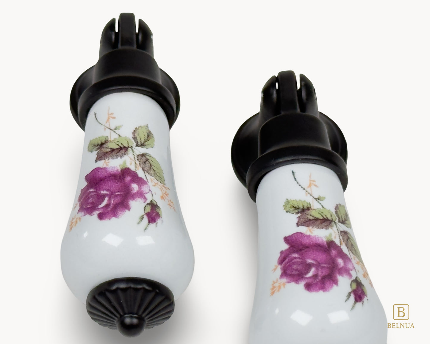 Angled pair of Verossa porcelain handles with rose floral decoration and black metal bases