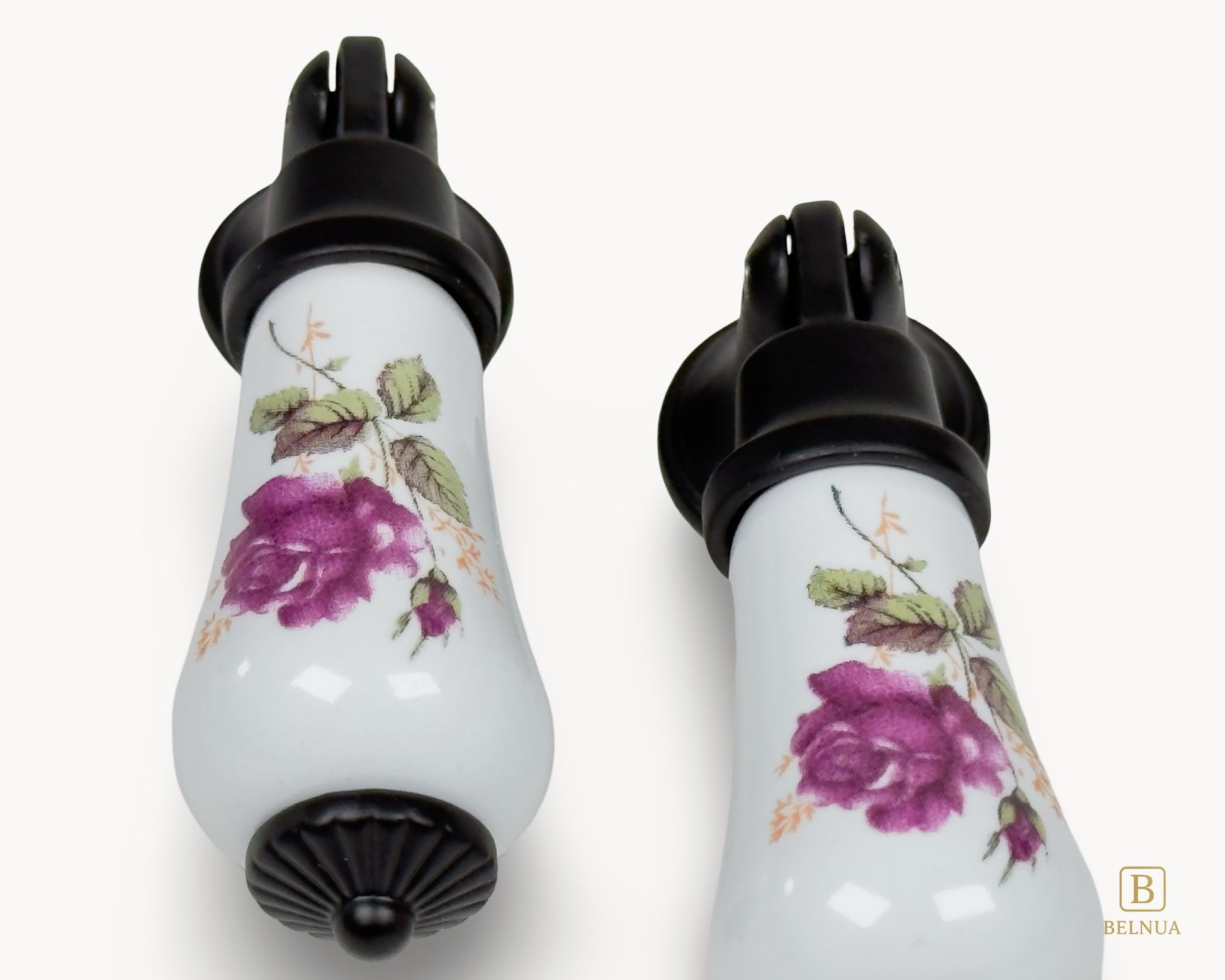 Angled pair of Verossa porcelain handles with rose floral decoration and black metal bases