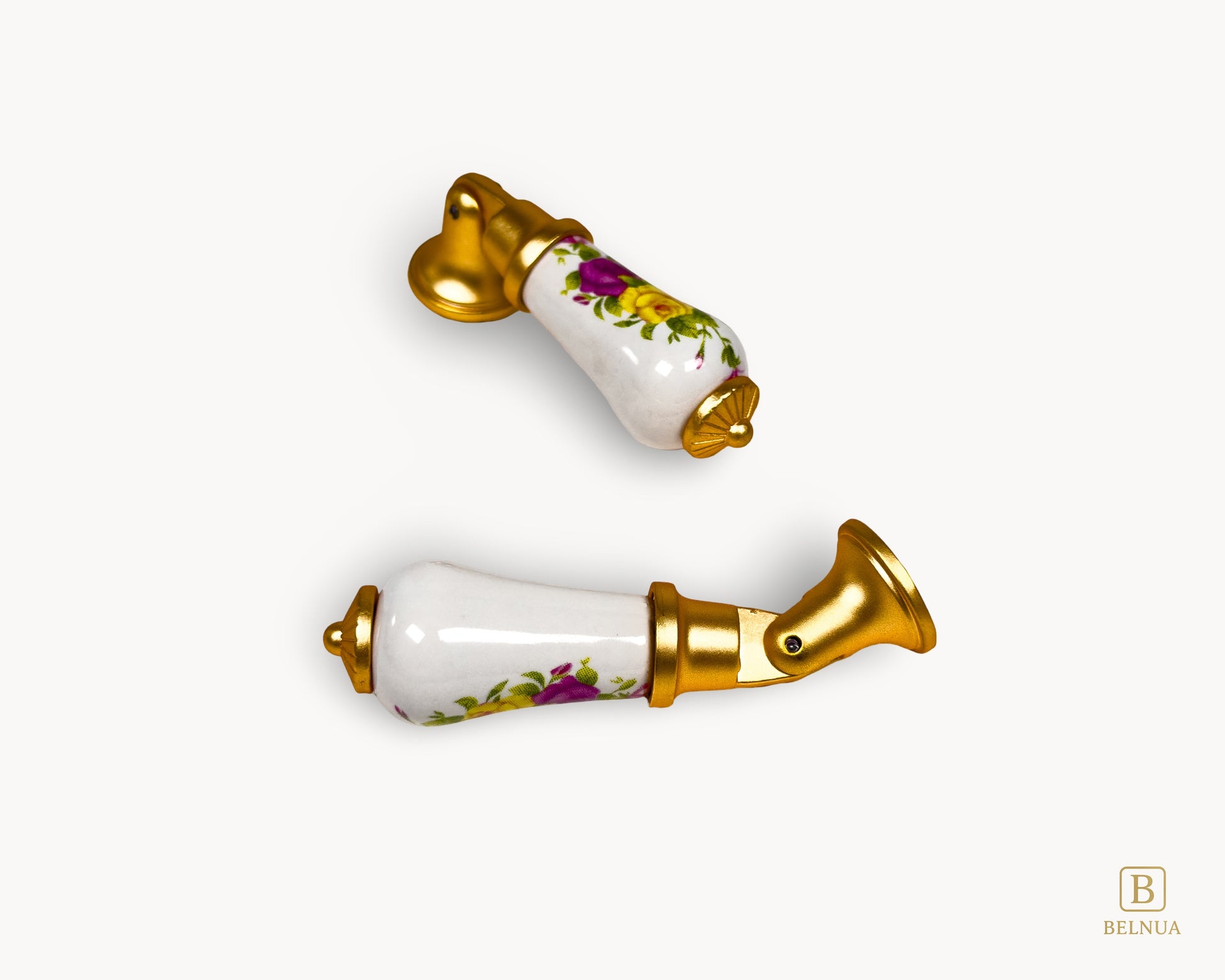 Top view of floral porcelain handle with gold detailing, showing pattern placement and finish.