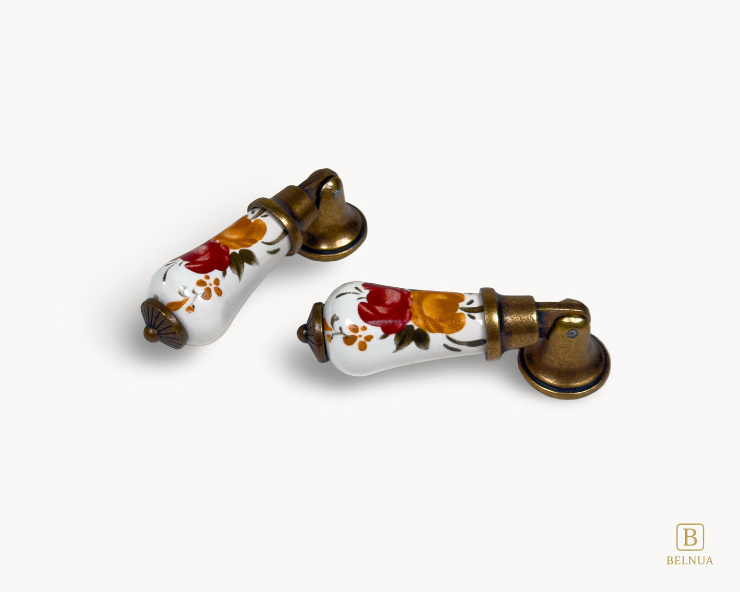 Perspective view of Verossa porcelain handle showing curved ceramic form and antique brass base