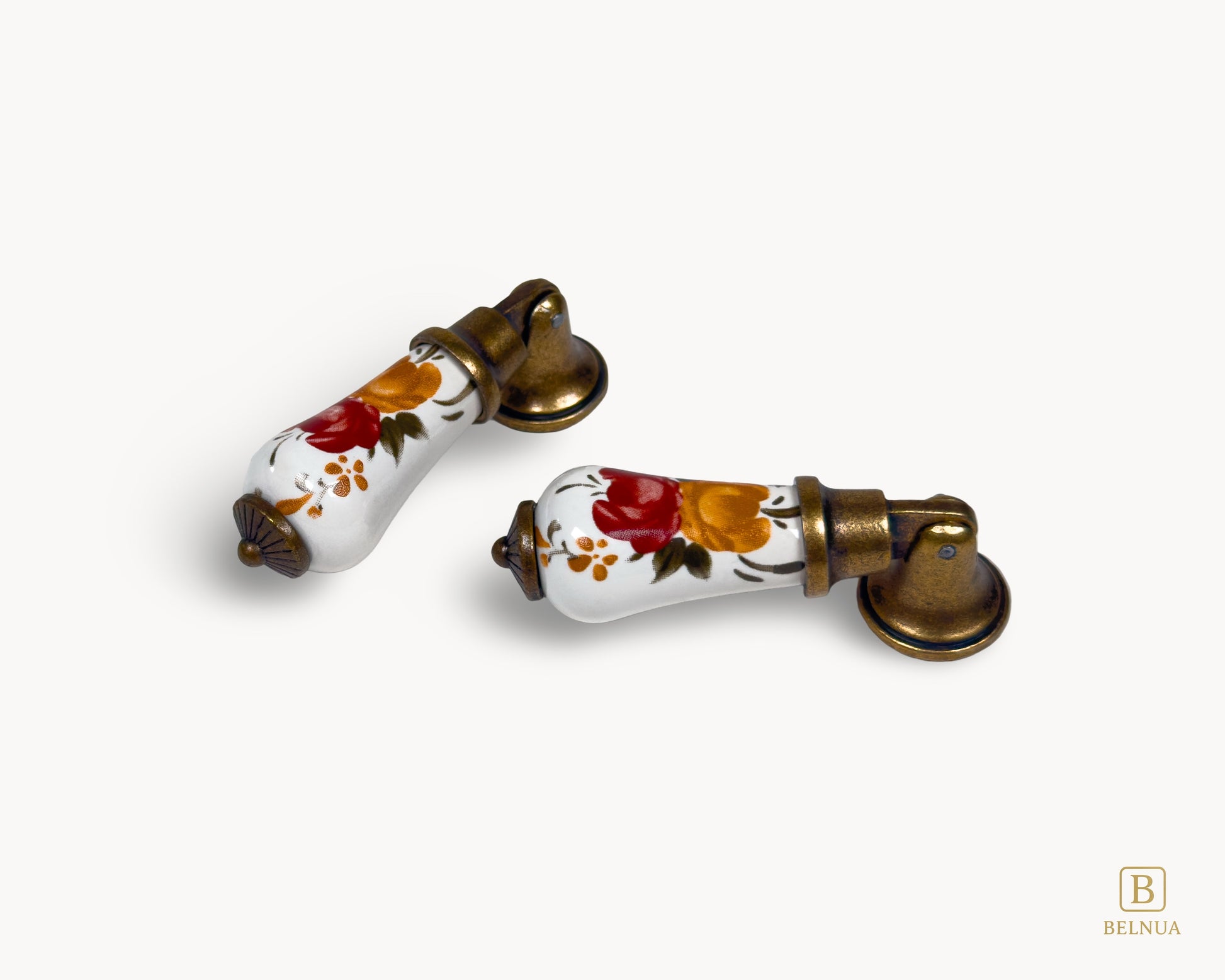 Perspective view of Verossa porcelain handle showing curved ceramic form and antique brass base
