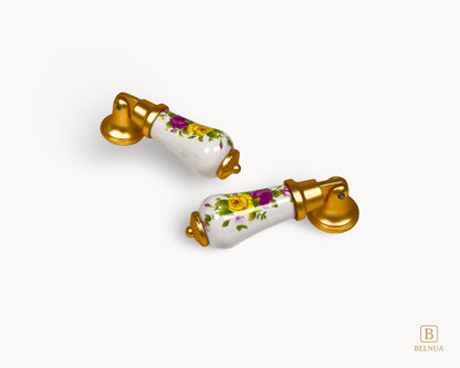 Front view of Verossa porcelain handle featuring yellow and purple floral design with gold mount.