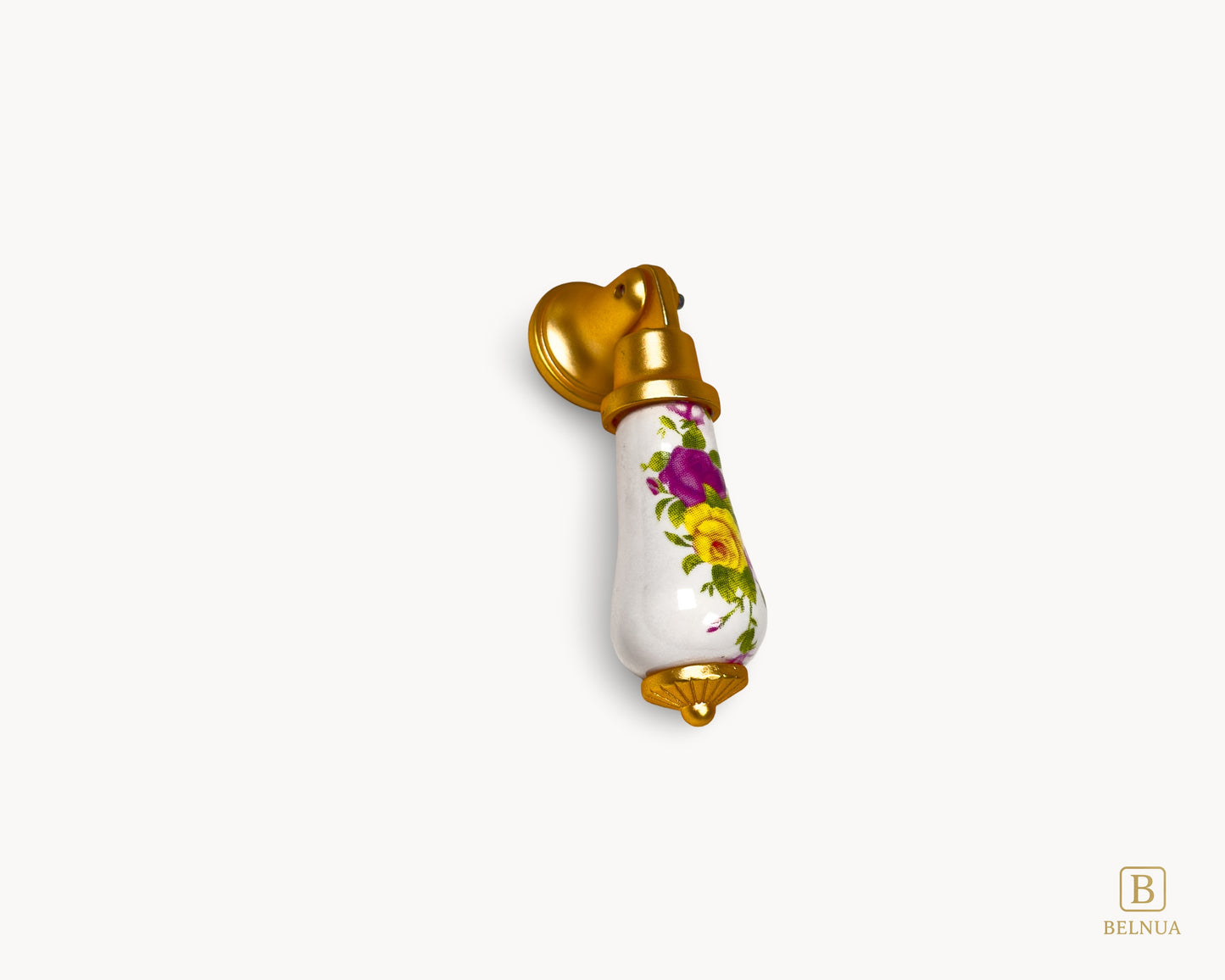 Single Verossa porcelain handle with floral design and satin gold base on white background.