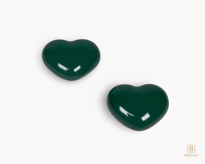 Angled view of Belnua Veyla dark green porcelain heart-shaped knob