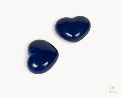 Pair of Belnua Veyla cobalt blue heart porcelain knobs displayed on porcelain white background