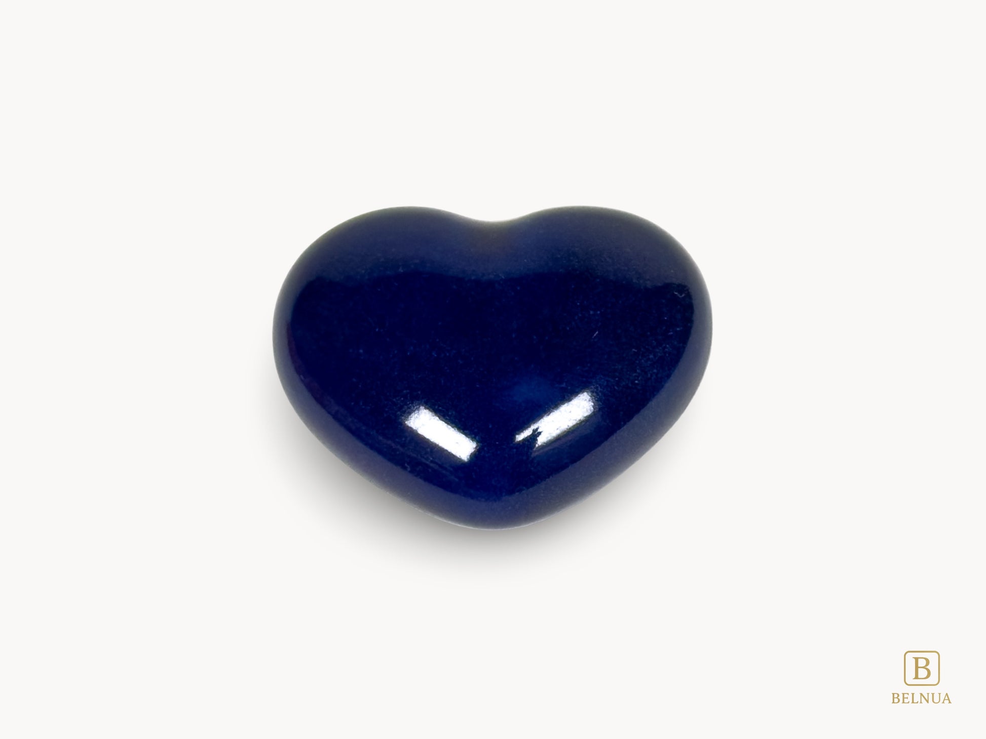 Belnua Veyla heart-shaped porcelain knob in cobalt blue, single knob front view on porcelain white background