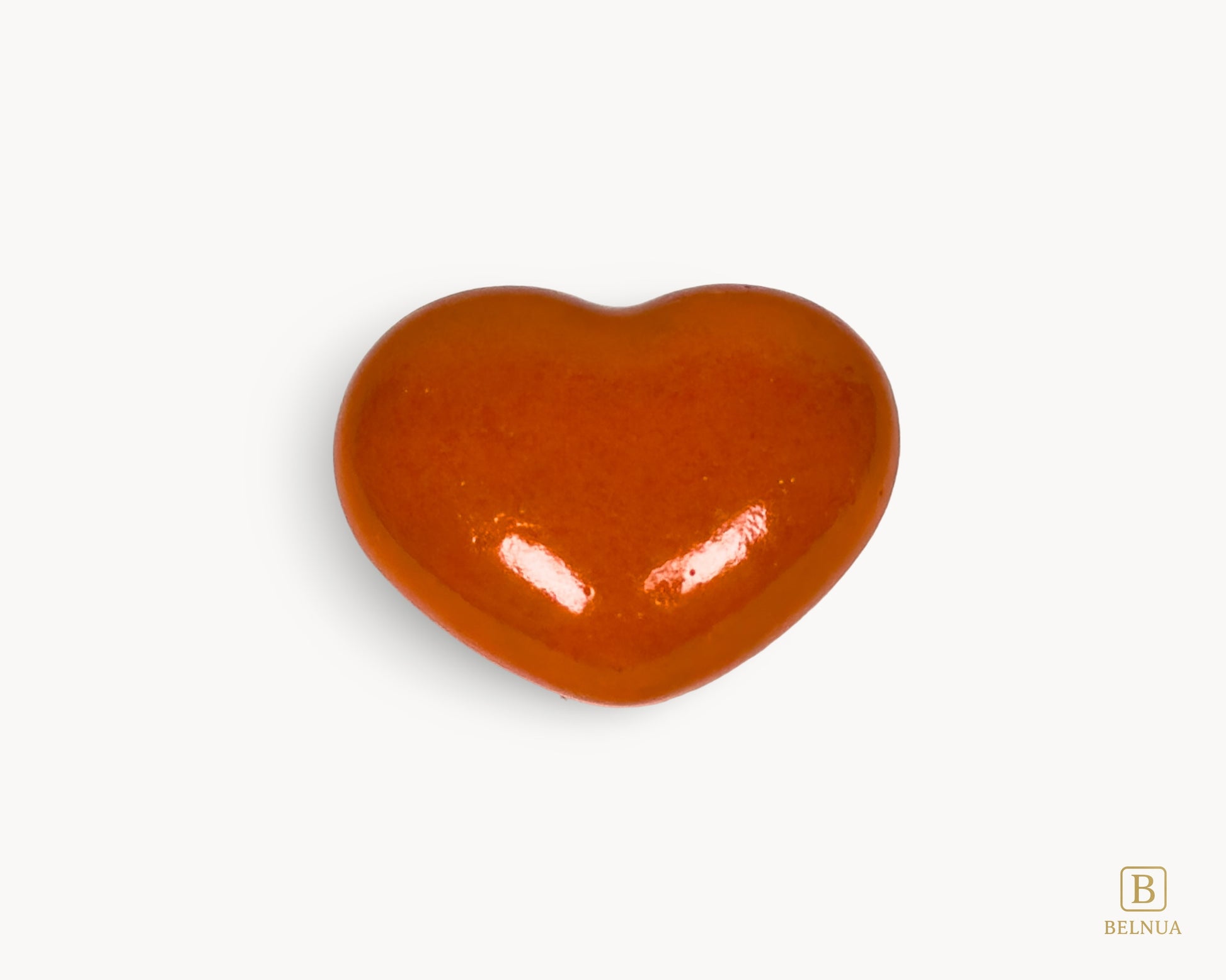 Belnua Veyla orange heart-shaped porcelain cabinet knob, front view
