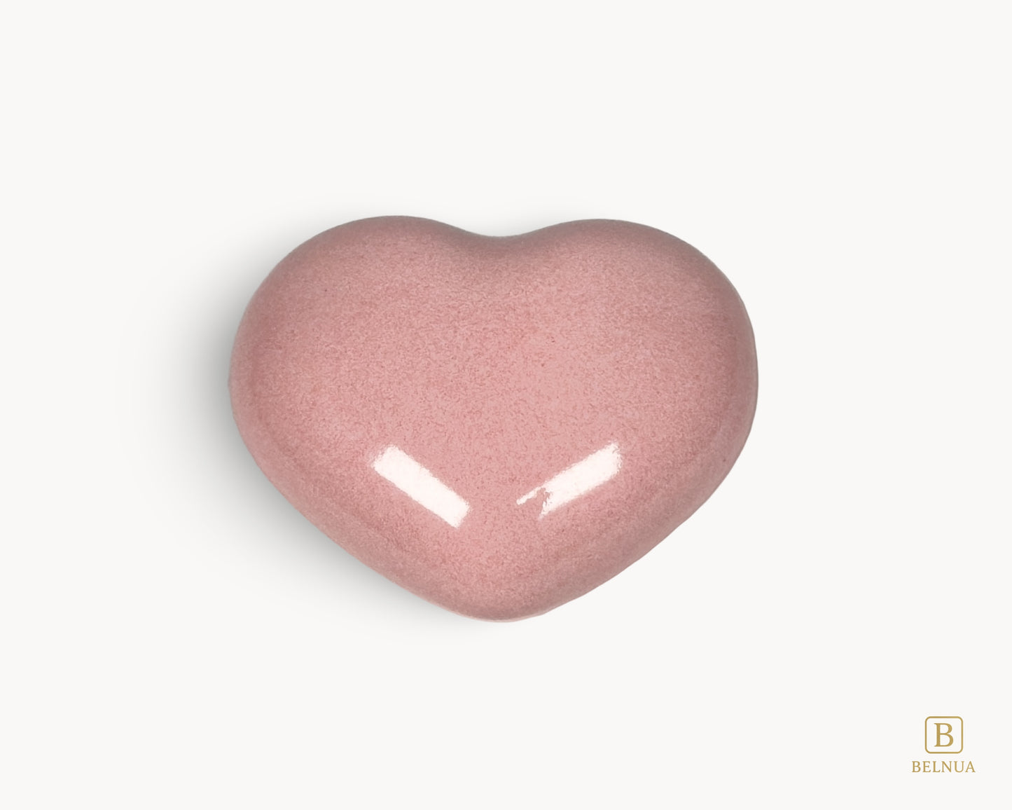 Pink porcelain heart-shaped knob from the Belnua Veyla collection, shown in a clean front view.