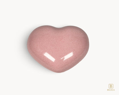 Pink porcelain heart-shaped knob from the Belnua Veyla collection, shown in a clean front view.