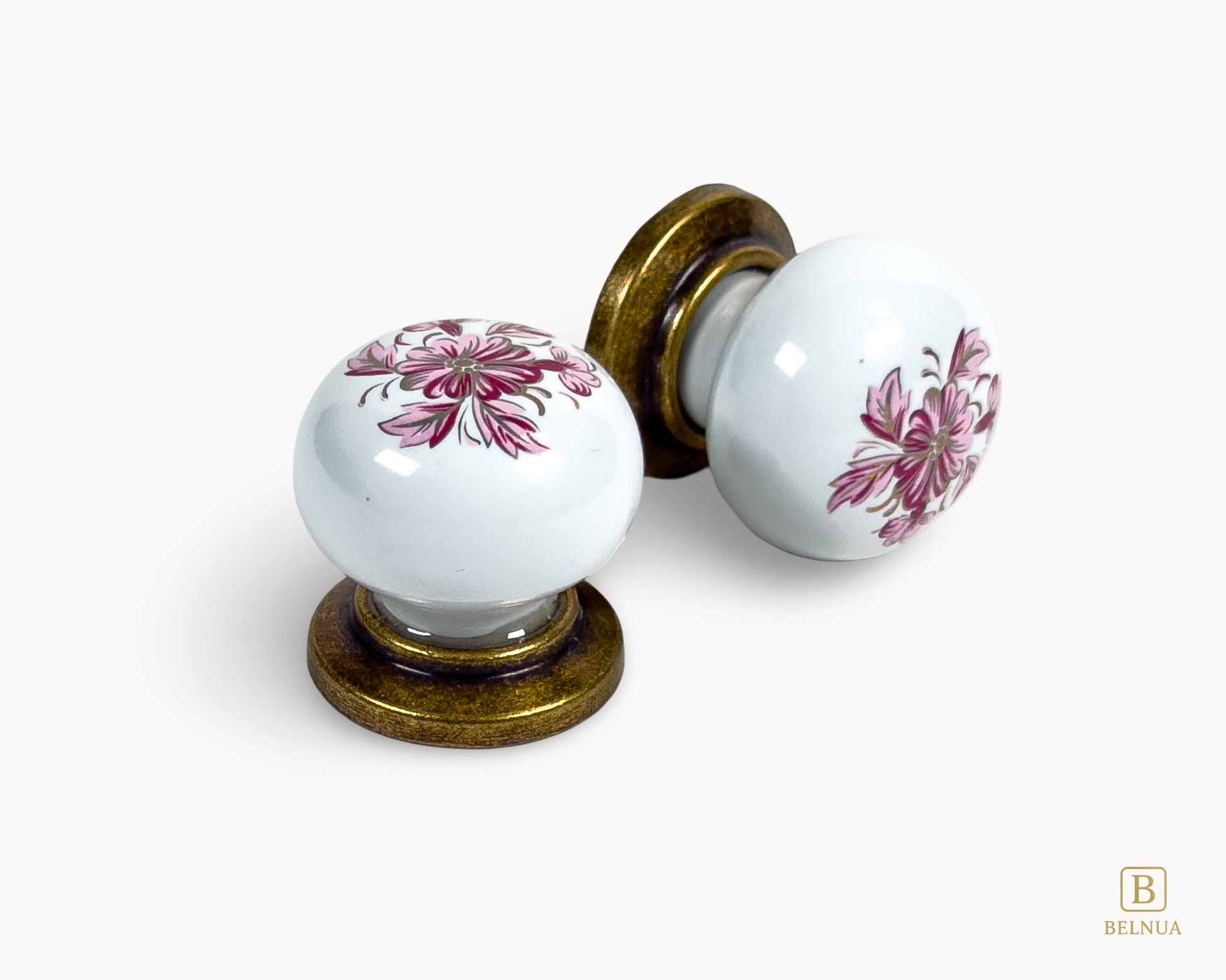 Belnua - ZERRA knob pair with vintage petal motif on white porcelain and antique brass base