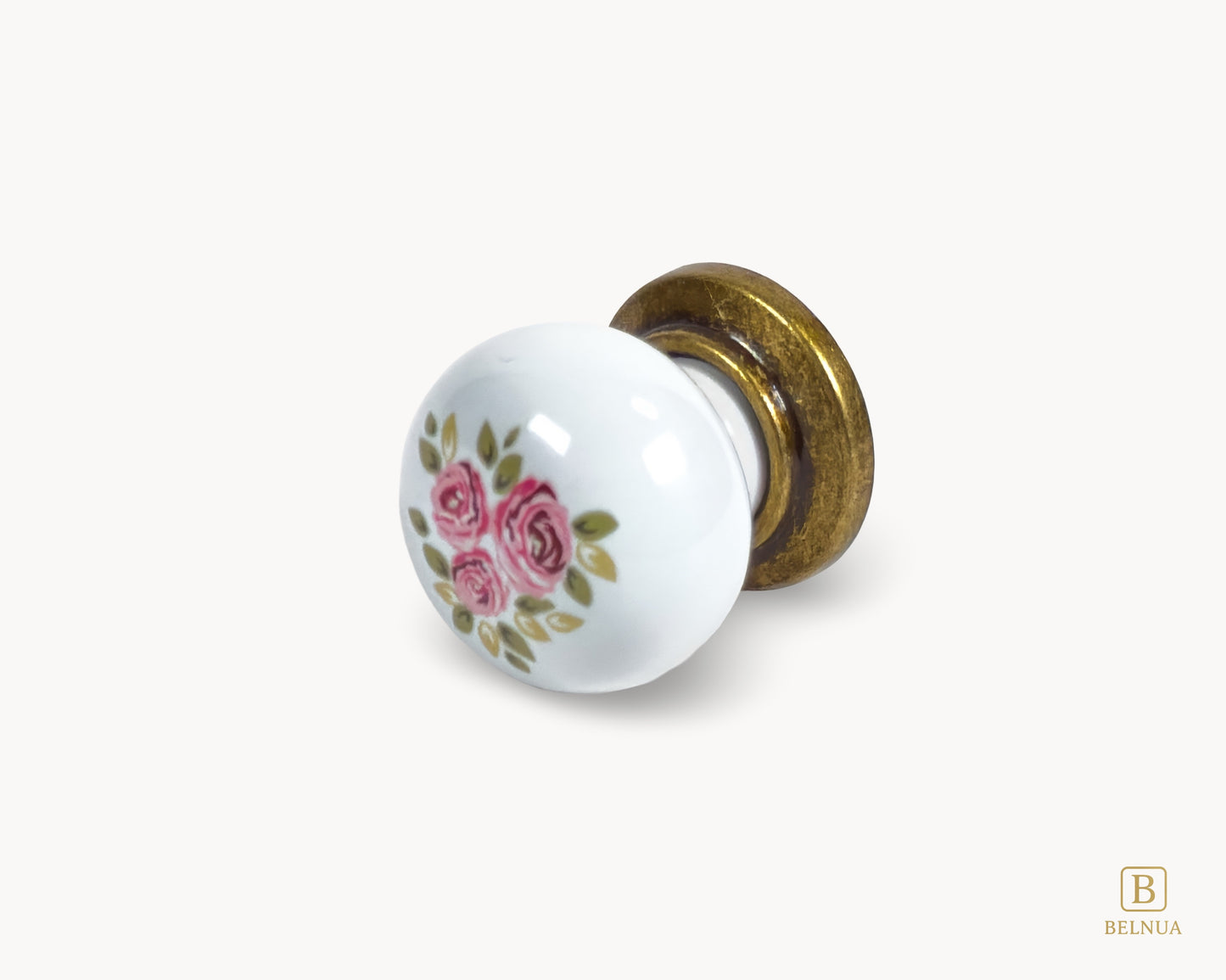 Belnua - Left flat lay view ZERRA porcelain/ceramic white knobs showing antique brass base and wildflowers design