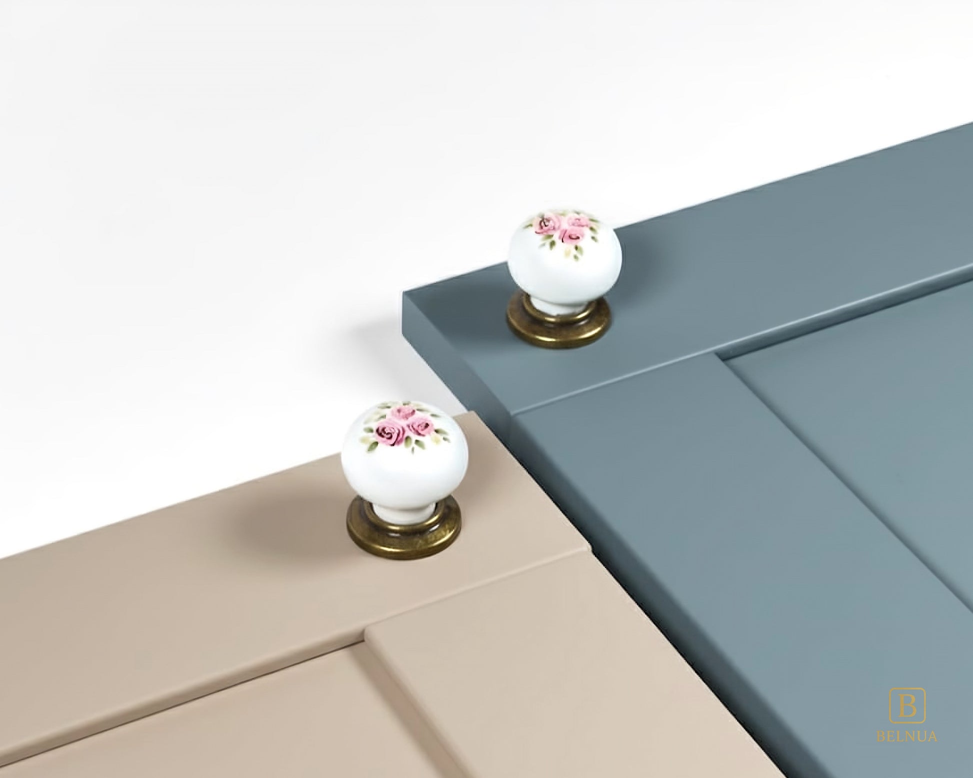 Belnua - Antique brass base ZERRA porcelain/ceramic white knob with Wildflower Garden design on light taupe and dusty blue cabinet door showcase