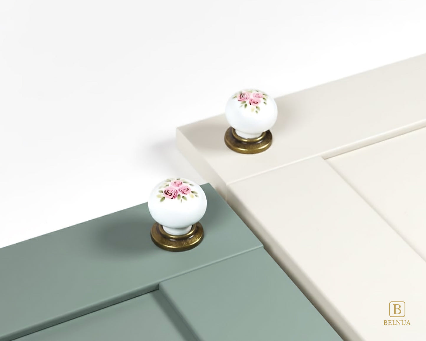 Belnua - Antique brass base ZERRA porcelain/ceramic white knob with Wildflower Garden design on sage green and cream cabinet door showcase