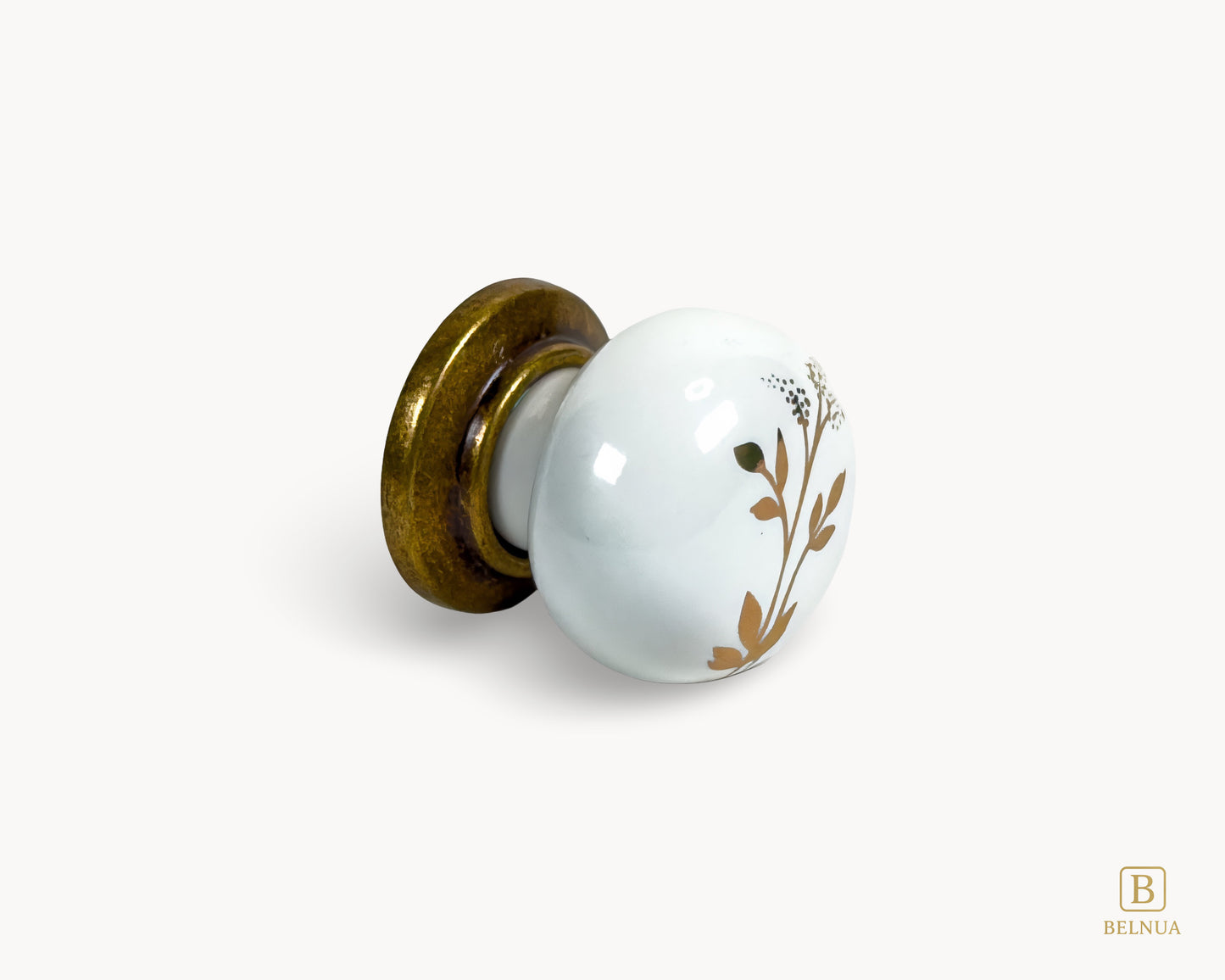 Right side view of Zerra decorative ceramic/porcelain knob with brass base and earth brown floral design | Belnua