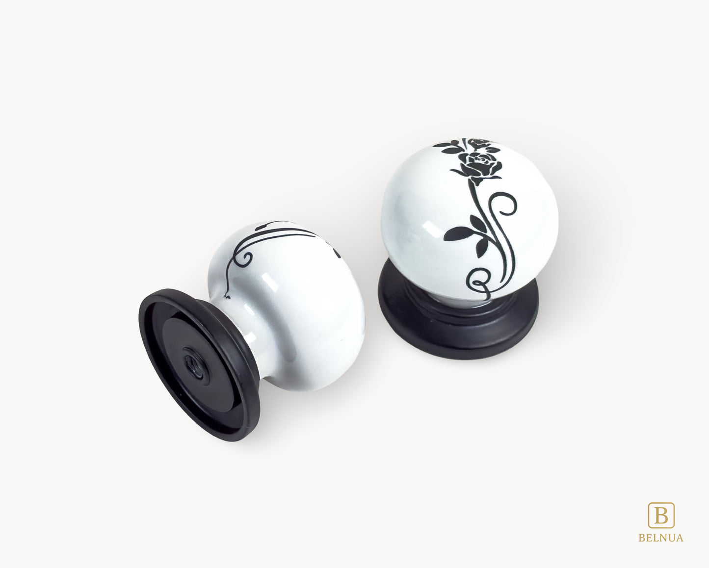 Belnua - Angled back and top view of ZERRA porcelain white knob showing floral design