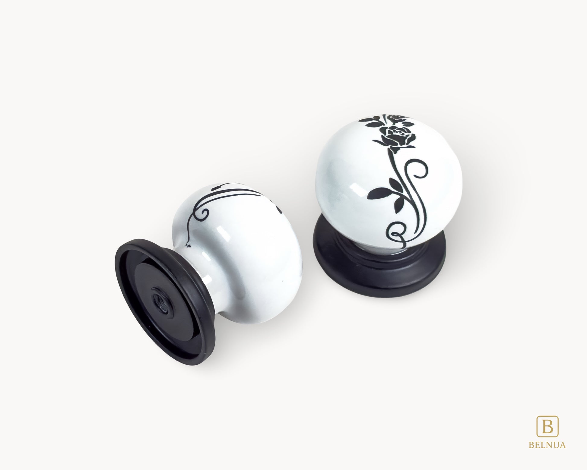 Belnua - Angled back and top view of ZERRA porcelain white knob showing floral design