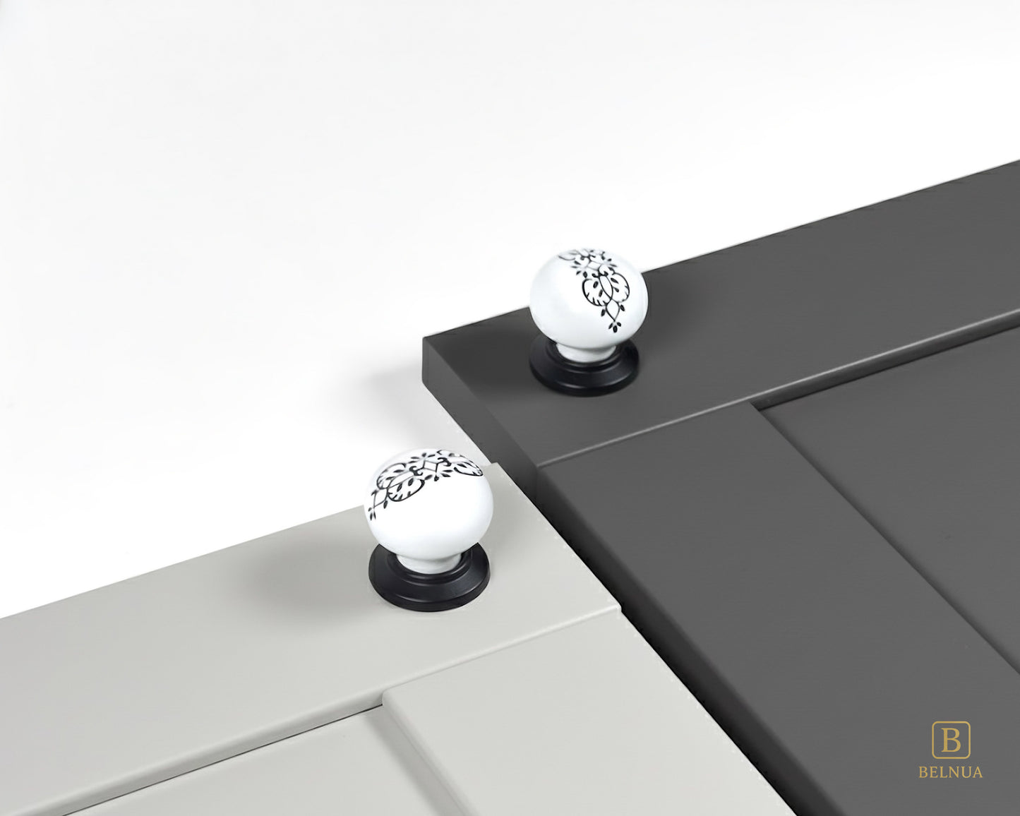 Belnua - ZERRA porcelain/ceramic white knob with ink petal motif on light grey and charcoal grey cabinet door