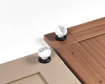 Belnua - ZERRA porcelain/ceramic white knob with ink petal motif on light taupe and walnut wood grain cabinet door
