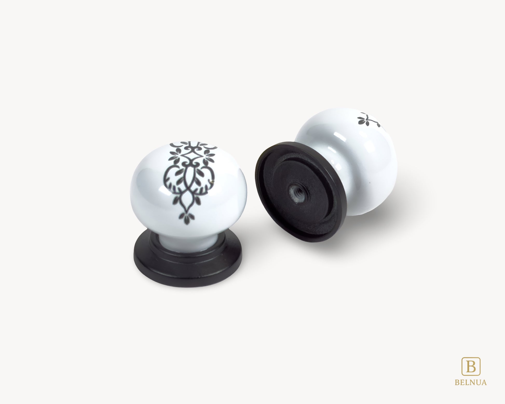 Belnua - Top and back view of delicate ZERRA floral ink pattern on white porcelain knob with matte black base