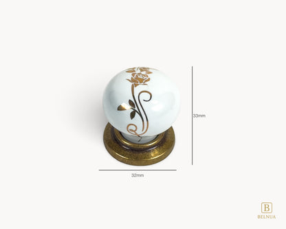 Belnua - Measurements of ZERRA white ceramic/porcelain knob with golden scroll motif and antique brass base