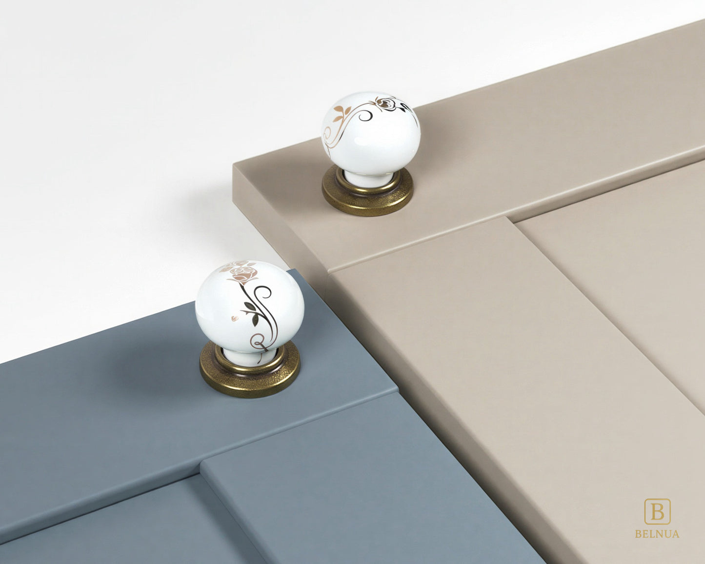 Belnua - ZERRA porcelain/ceramic white knob with golden scroll motif with antique brass base on dusty blue and light taupe cabinet door