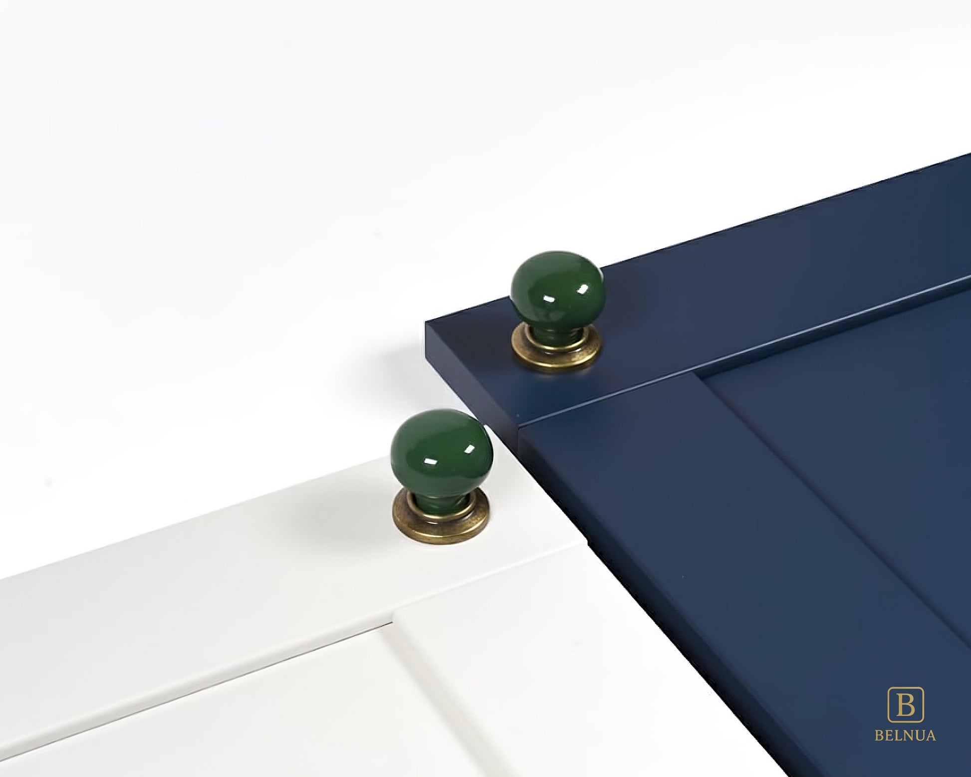 Belnua - ZERRA knob with plain dark green porcelain/ceramic on porcelain white and navy blue cabinet door