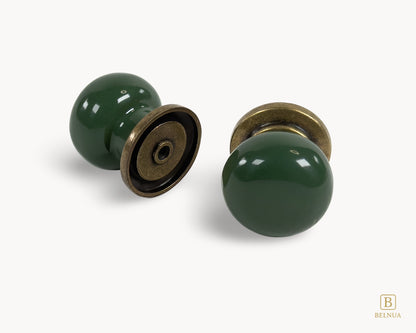 Belnua - Back and front angled view showing green porcelain and antique brass finish
