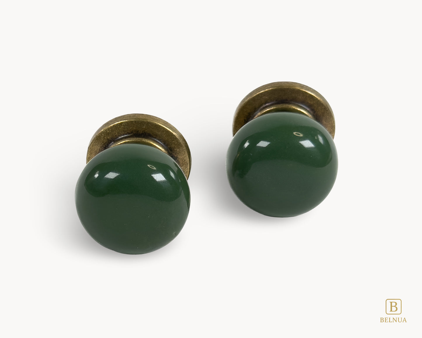 Belnua - Front flat lay view of antique brass knob with dark green porcelain insert