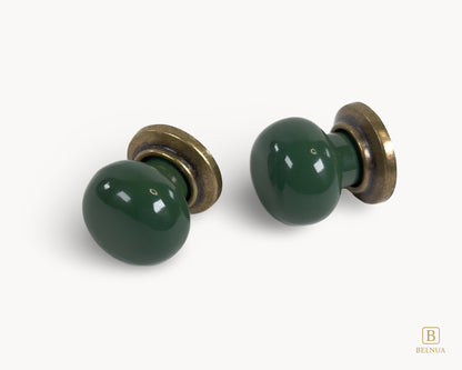 Belnua - ZERRA knob with plain dark green ceramic/porcelain and antique brass base