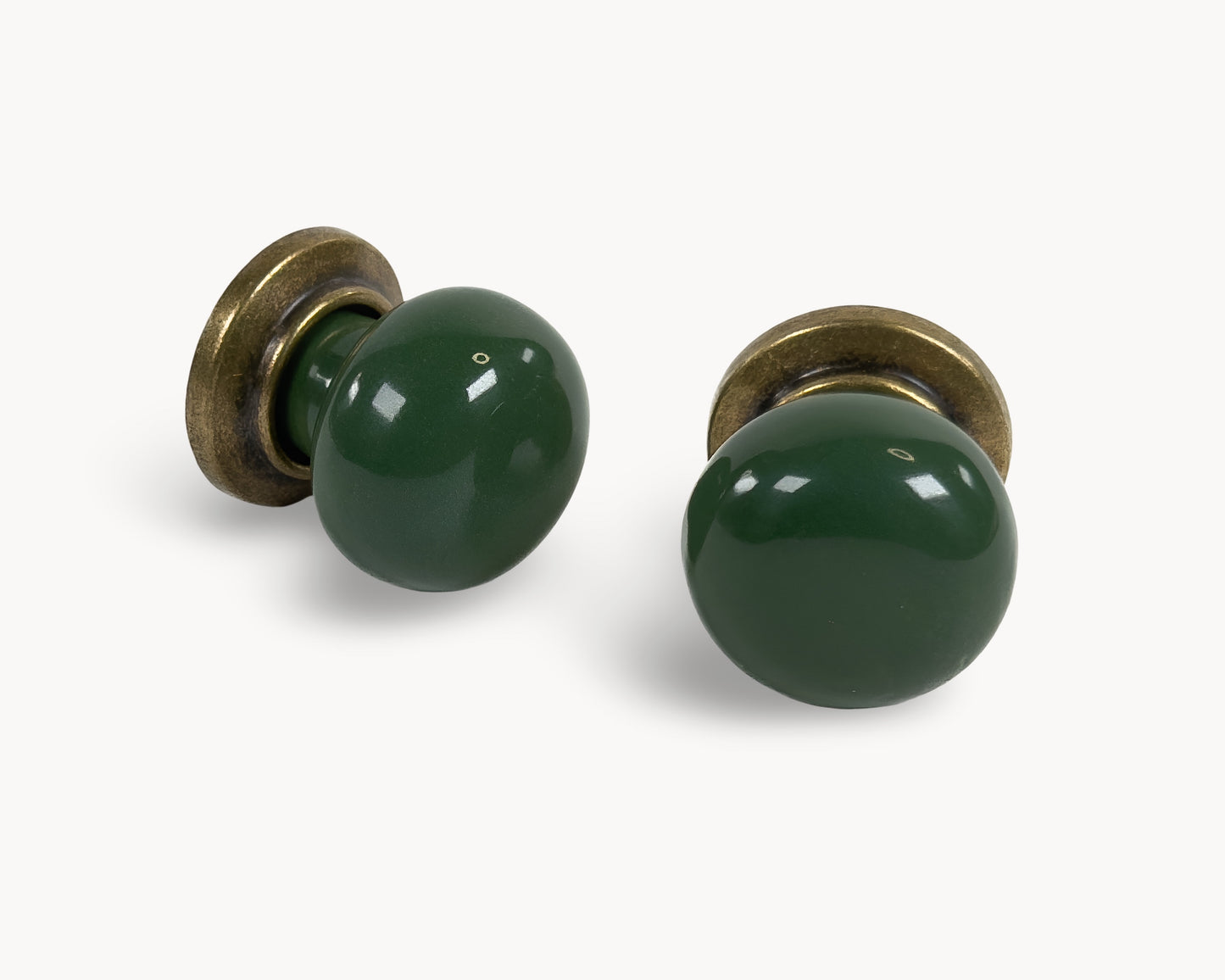 Belnua - ZERRA knob with plain dark green ceramic/porcelain and antique brass base