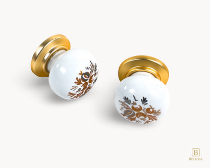 Belnua - ZERRA cabinet gold knob side detail of floral arch pattern on white porcelain/ceramic insert