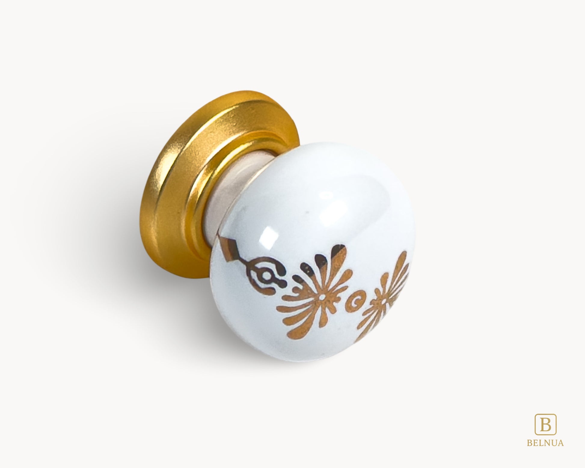 Belnua - Right angled view of ZERRA matte gold knob with white floral porcelain