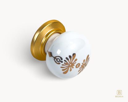 Belnua - Right angled view of ZERRA matte gold knob with white floral porcelain