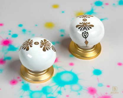ZERRA Knob – Matte Gold with White Porcelain Insert (Golden Blossom Motif)