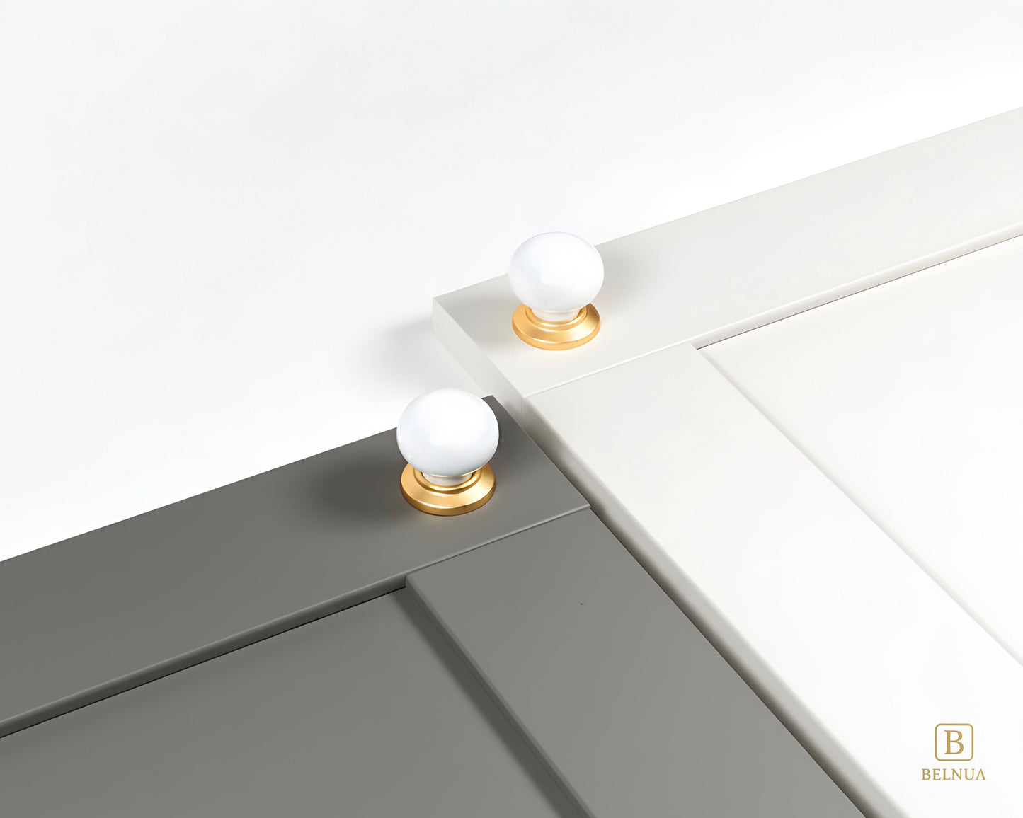 Zerra gold with plain white porcelain knob on light grey and white cabinet doors | Belnua
