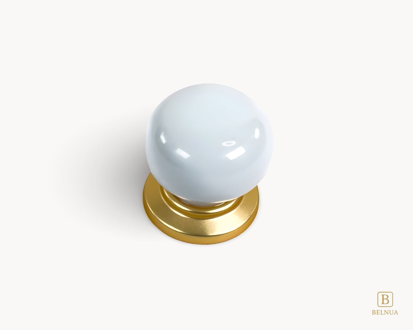 Top view of Zerra white porcelain / ceramic knob with gold base | Belnua