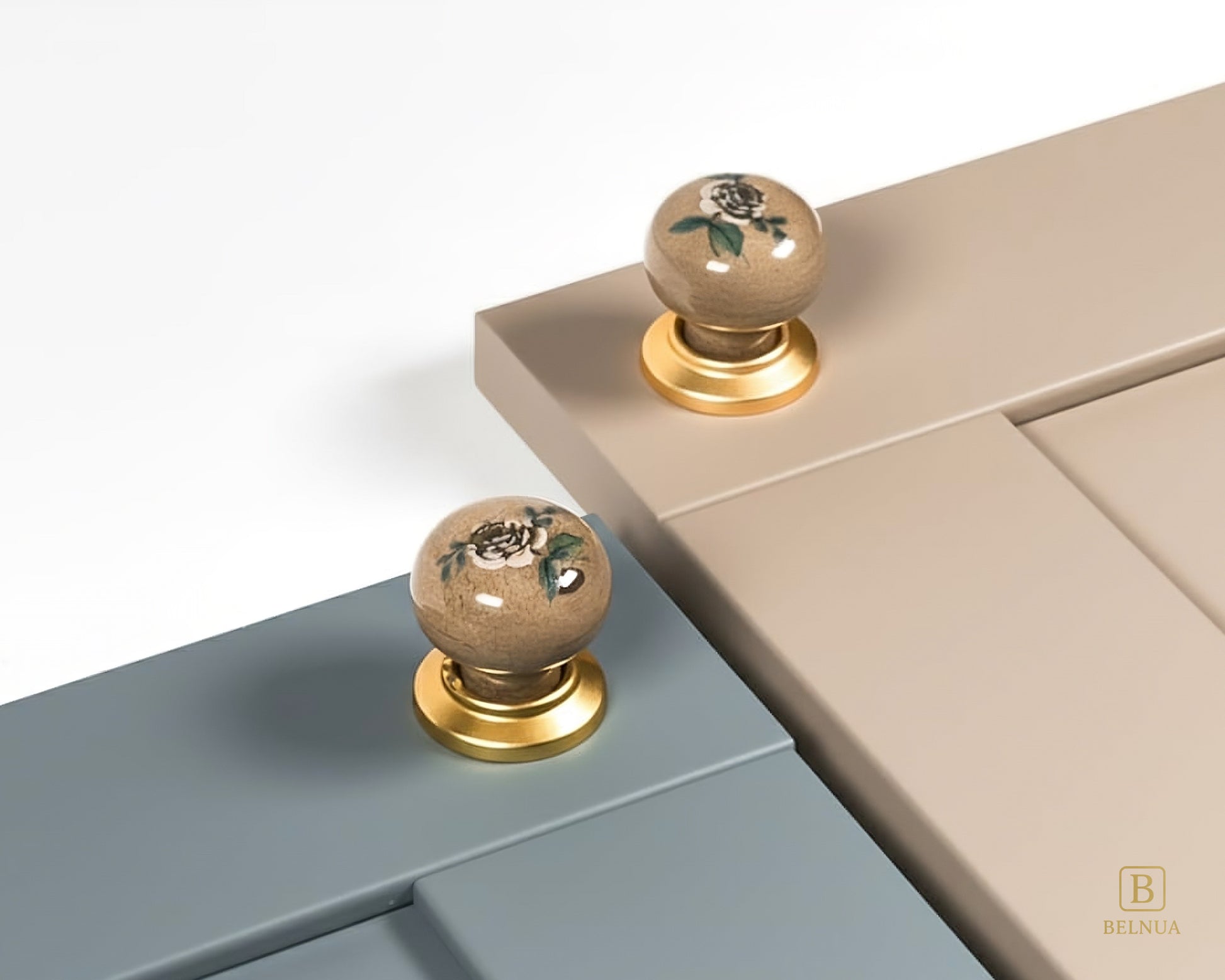 Belnua - ZERRA porcelain/ceramic tan knob pair with elegant rose motif on dusty blue & stone beige cabinet door showcase