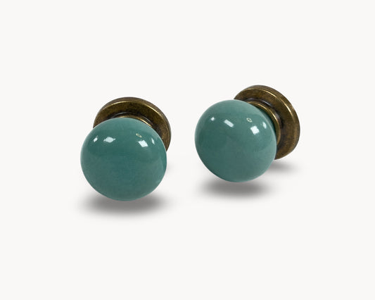 ZERRA knob with turquoise porcelain insert and antique brass finish | Belnua