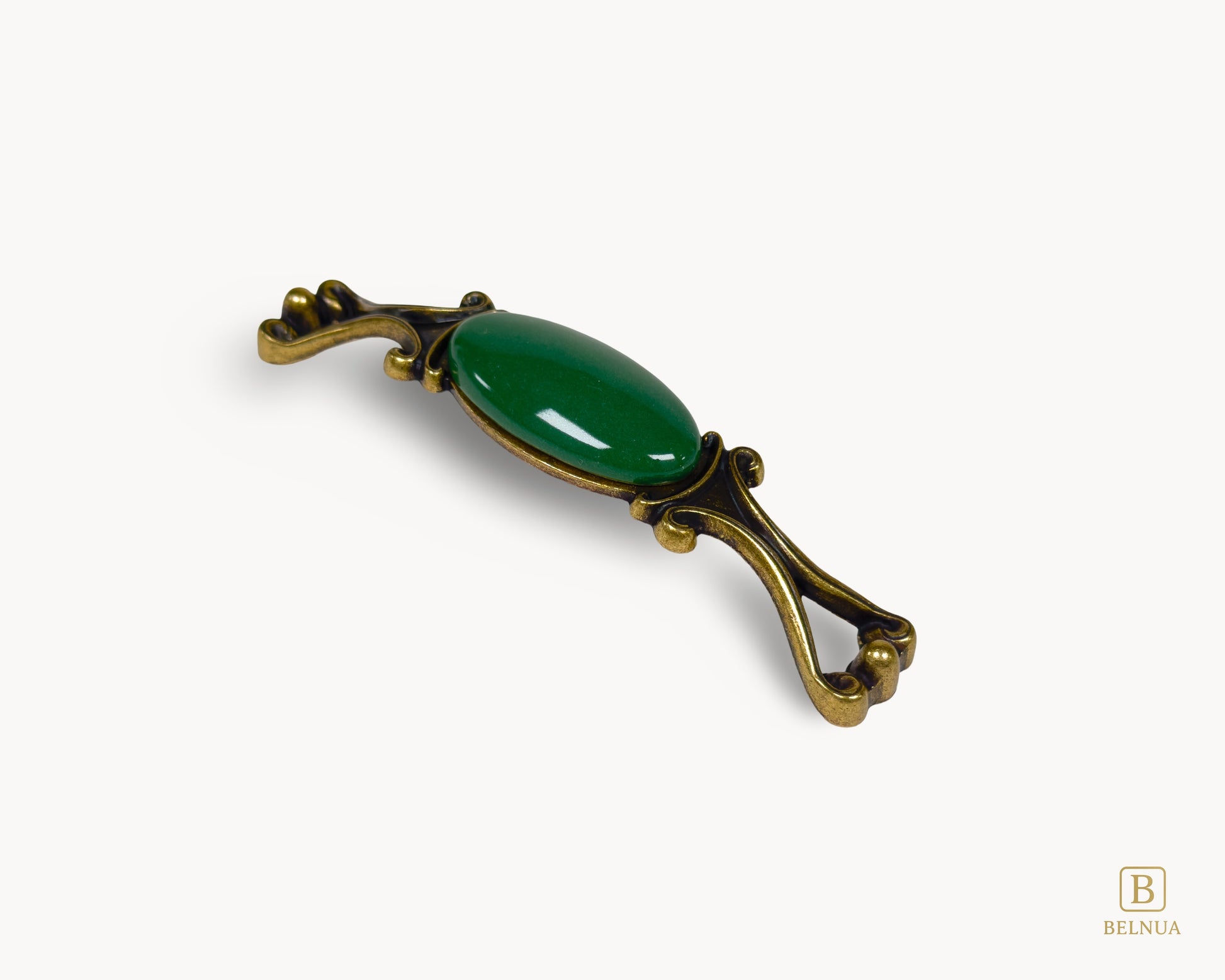 Belnua - Right angled view of Nureya decorative cabinet handle with dark green porcelain and brass base  on a white surface