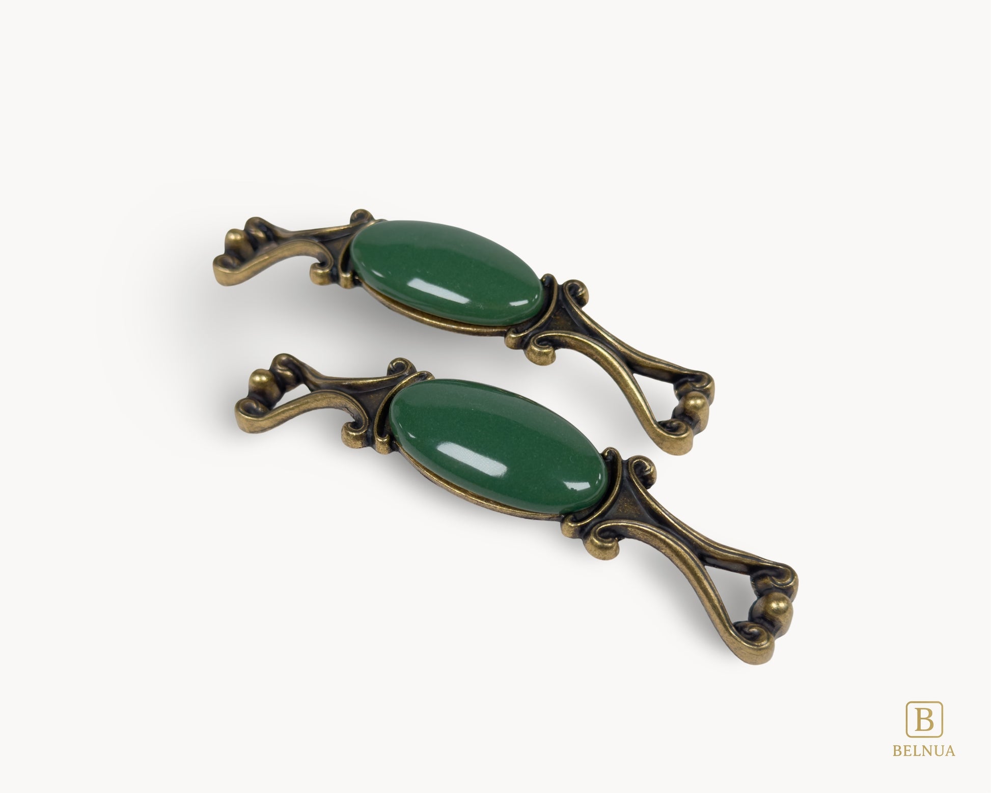 Belnua - Front and top view of Nureya decorative cabinet handle pair with dark green porcelain and brass base  on a white surface