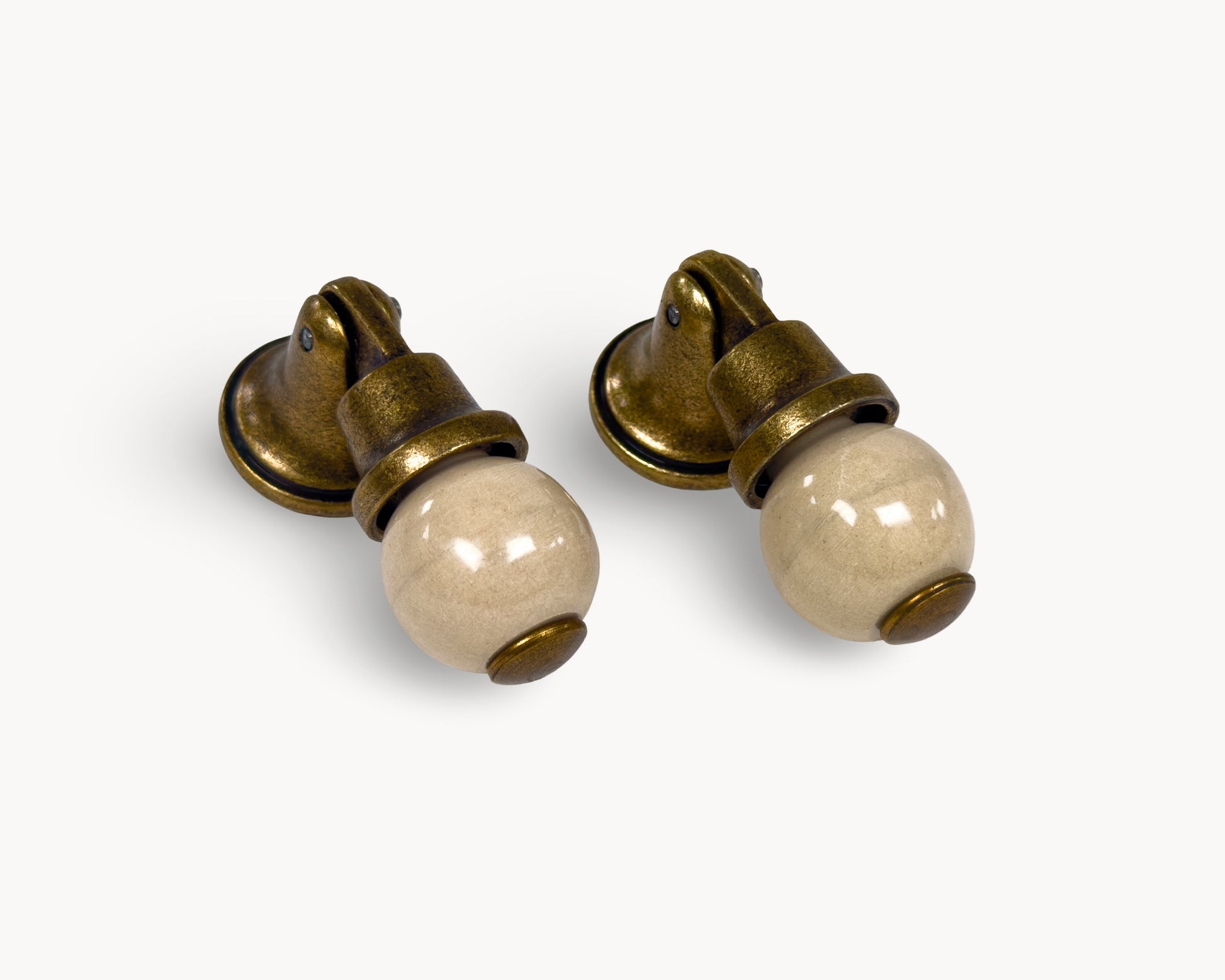 Belnua - Right angled view of Virella orange porcelain insert and sculptural antique brass base