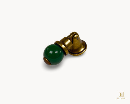 Belnua - Left angled view of VIRELLA green porcelain knob with antique brass base