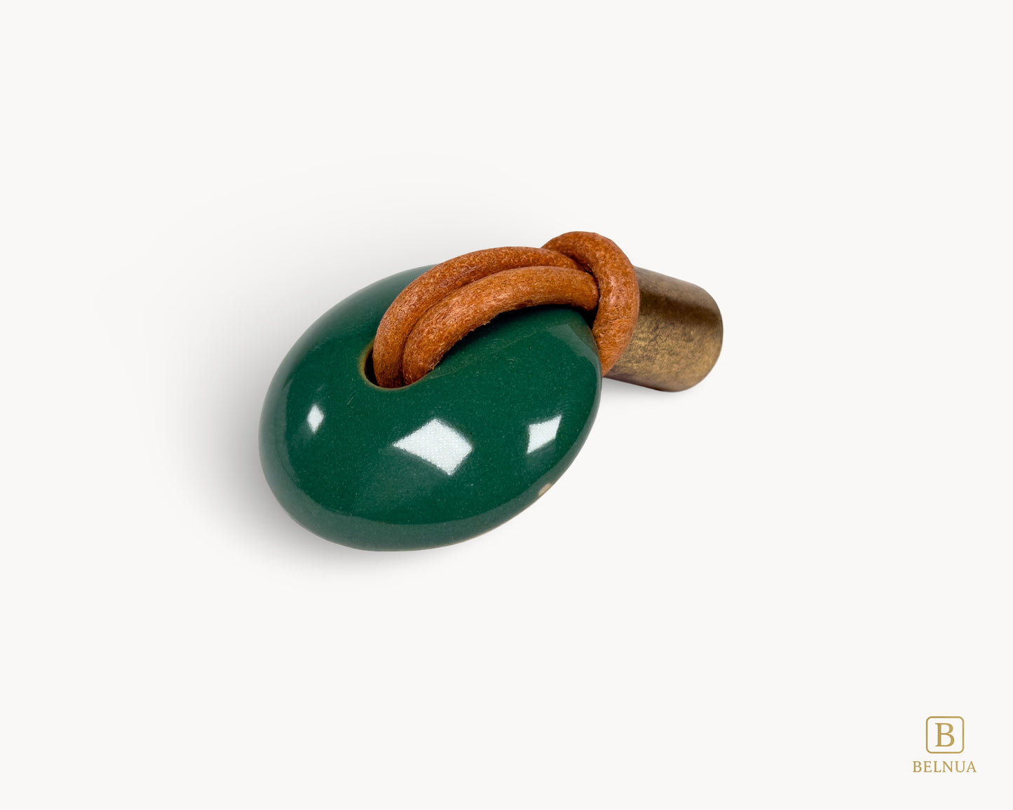 Green porcelain REVINA knob with brown leather loop and antique brass base