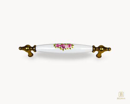 Lumora antique brass porcelain cabinet handle 160mm with floral design