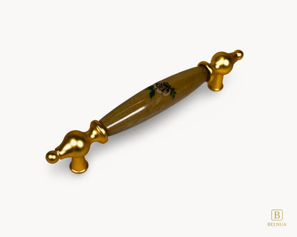 Angled view of Lumora gold porcelain handle 128mm with floral pattern