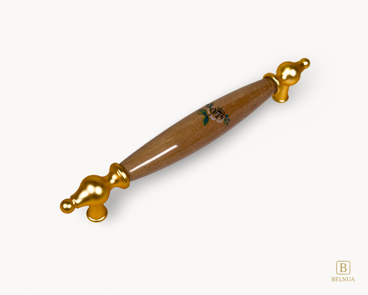 Angled view of Lumora gold porcelain handle 160mm with floral design