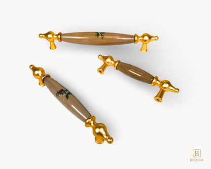 Lumora gold porcelain handle with hand-applied floral porcelain insert